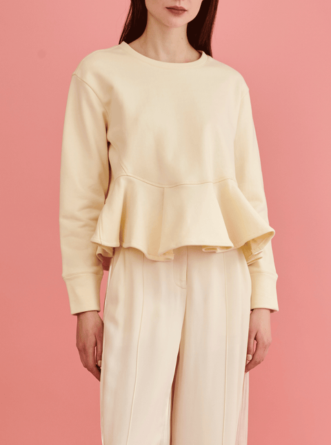 RHIE FLUTTER HEM SWEATSHIRT IN CREAM COLOR BONE