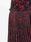 RHIE LAYERED BLACK AND RED PRINTED SKIRT DETAIL
