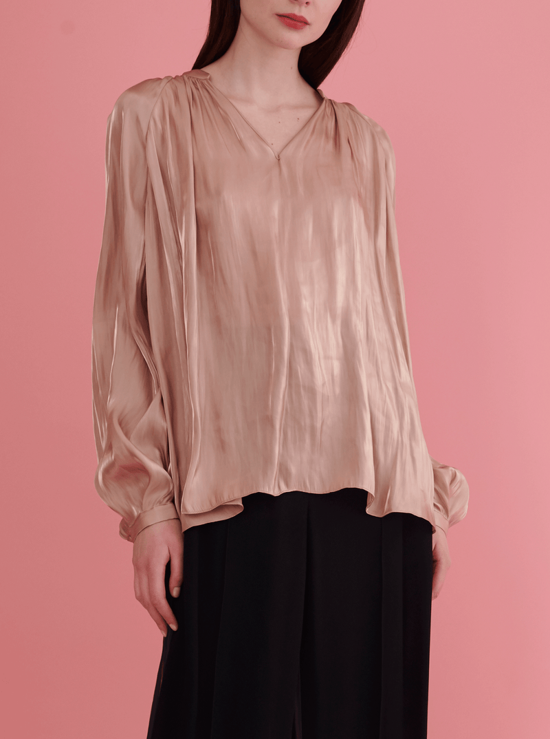 Rhie silky liquid charmeuse blouse in beige from the west village clothing boutique
